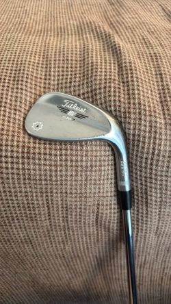 Taylormade golf bag and Titleist Vokey BV SM7 54 degree wedge