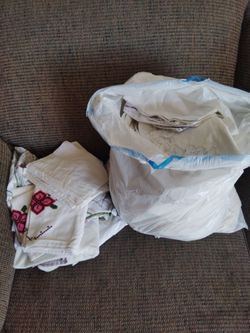Bag of pillow cases fitted sheets