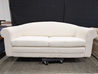 Cream-Colored Two-Seater Sofa