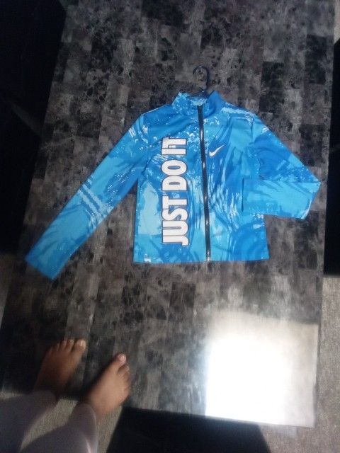 A Blue Nike Jacket