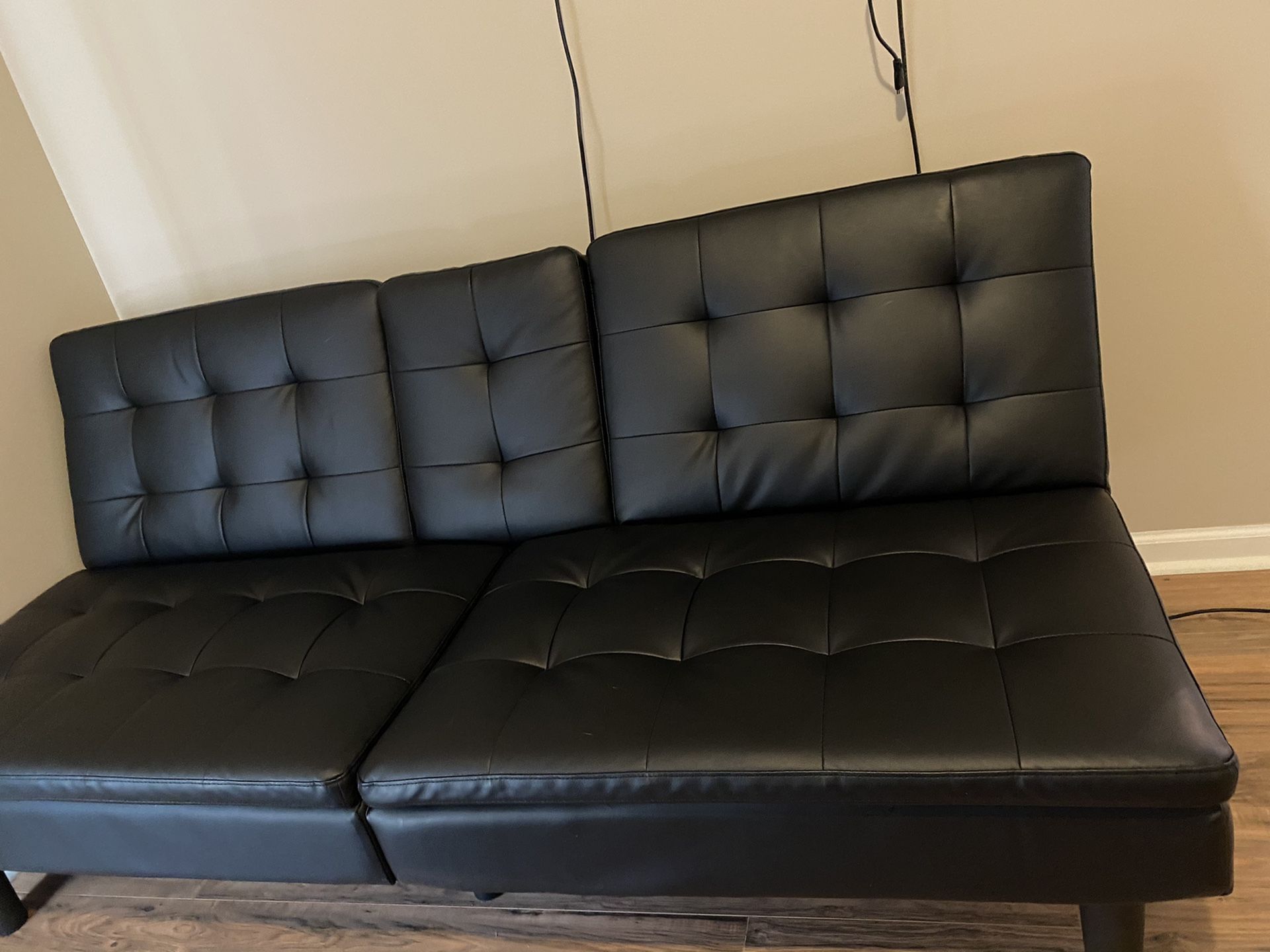 Black leather futon couch