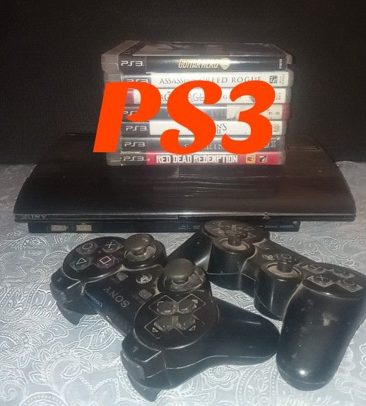 Working PS3 w/ 2 controllers, move motion camera, & 7 games