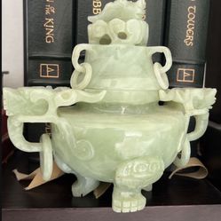Jade. Dragon Vase. Collectable.  Chinese Celadon Jade vase with beautiful carvings of dragon faces. Includes the top and rings which make an enchantin