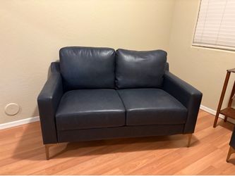 Serta faux leather love seat and matching chair