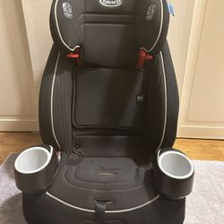 Graco Atlas 65 Car Seat: Converts from a forward-facing harness to a high-back booster seat.