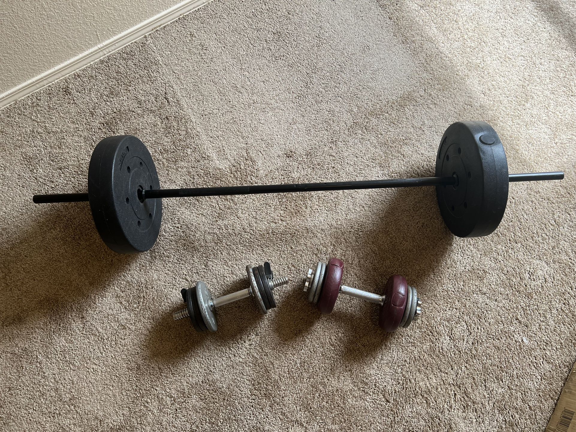 Two Dumbbells, Lift Bar, & Weights $70 or best offer