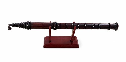 Wooden flute with stand