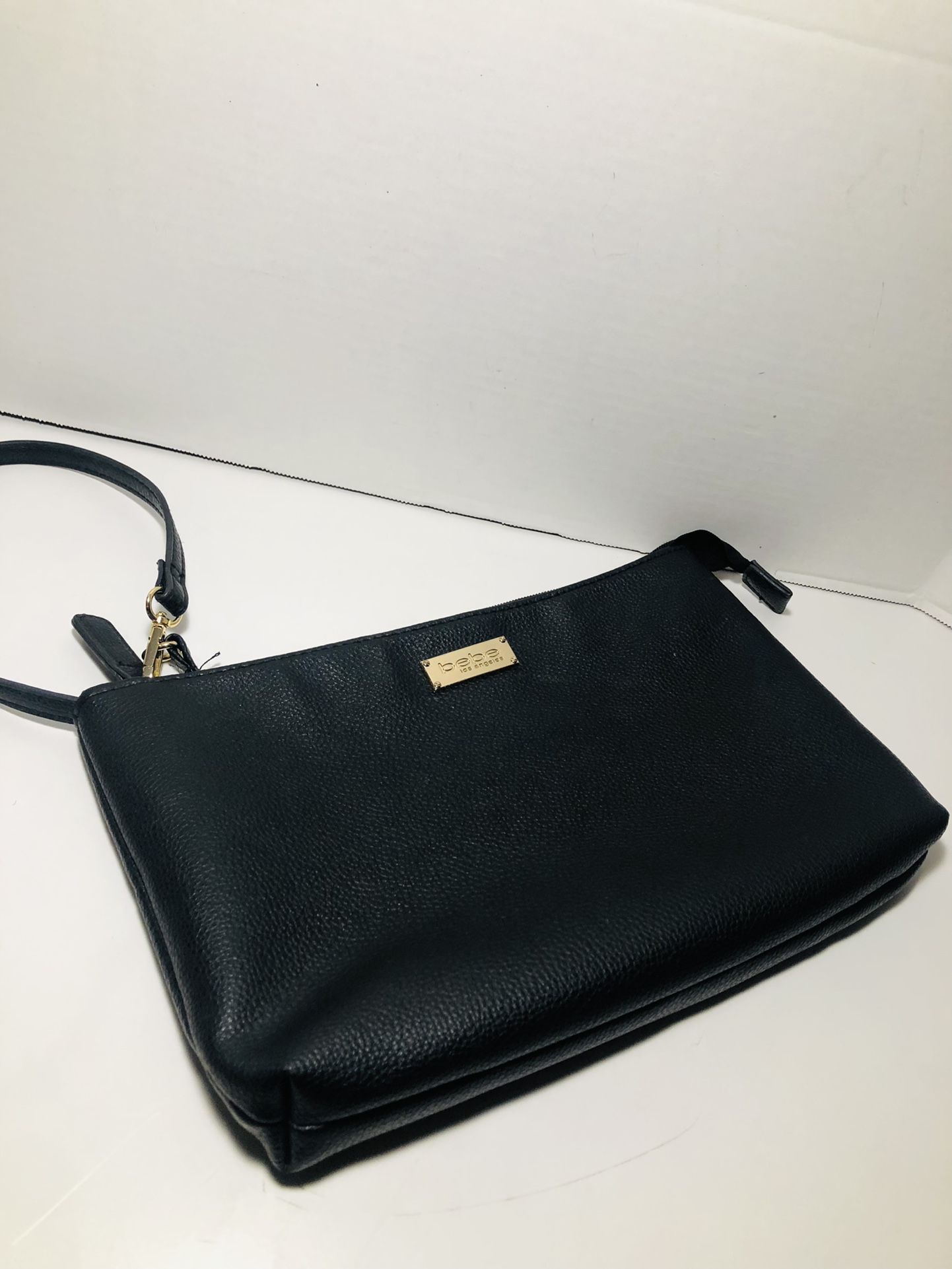 Gentle used Bebe Faux leather makeup bag