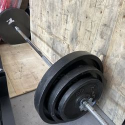 complete set of 50,25 and 10lb plates 1 inch hole with bar $175