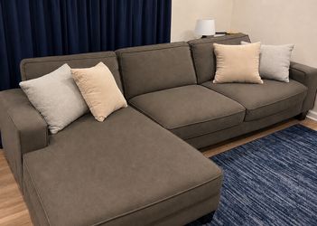 Gray sectional couch (pillows not included)