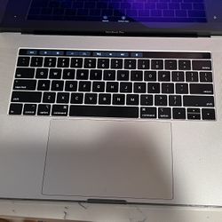 MacBook Pro Laptop w/ Touch Bar 