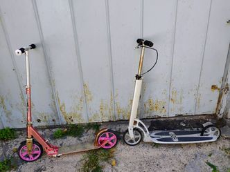 Two Kick Scooters Pink and White