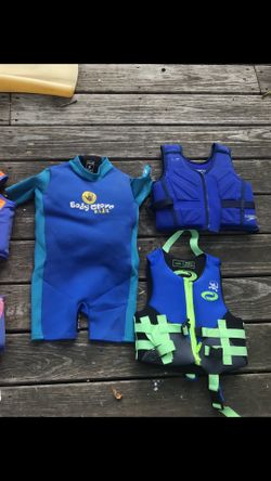 Kids swim vest and wetsuit