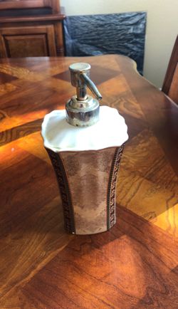 Soap dispenser for restroom