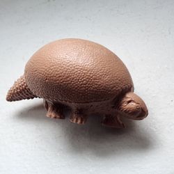 Invicta Glyptodon prehistoric figure.
