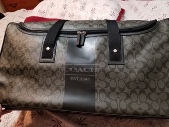 Coach douffle travel bag with wheels