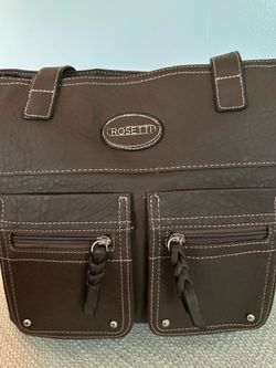 Brown handbag. Cartera color marron.