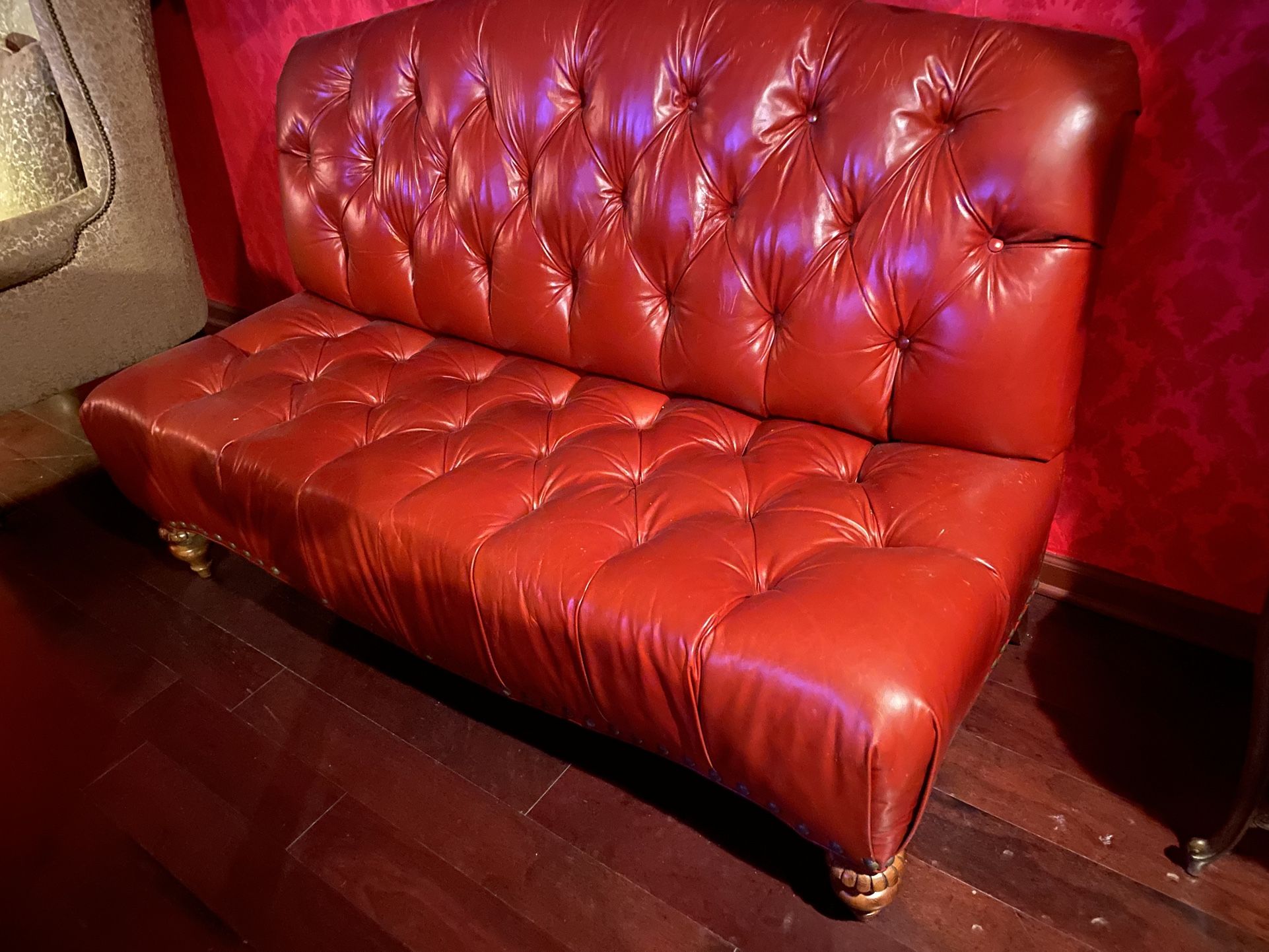 Vibrant Tufted Red Leather Sofa