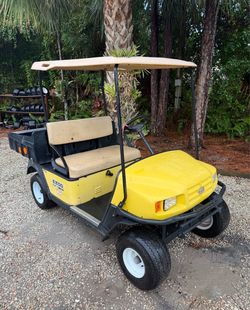 EZGO Yellow Utility Golf Cart GAS
