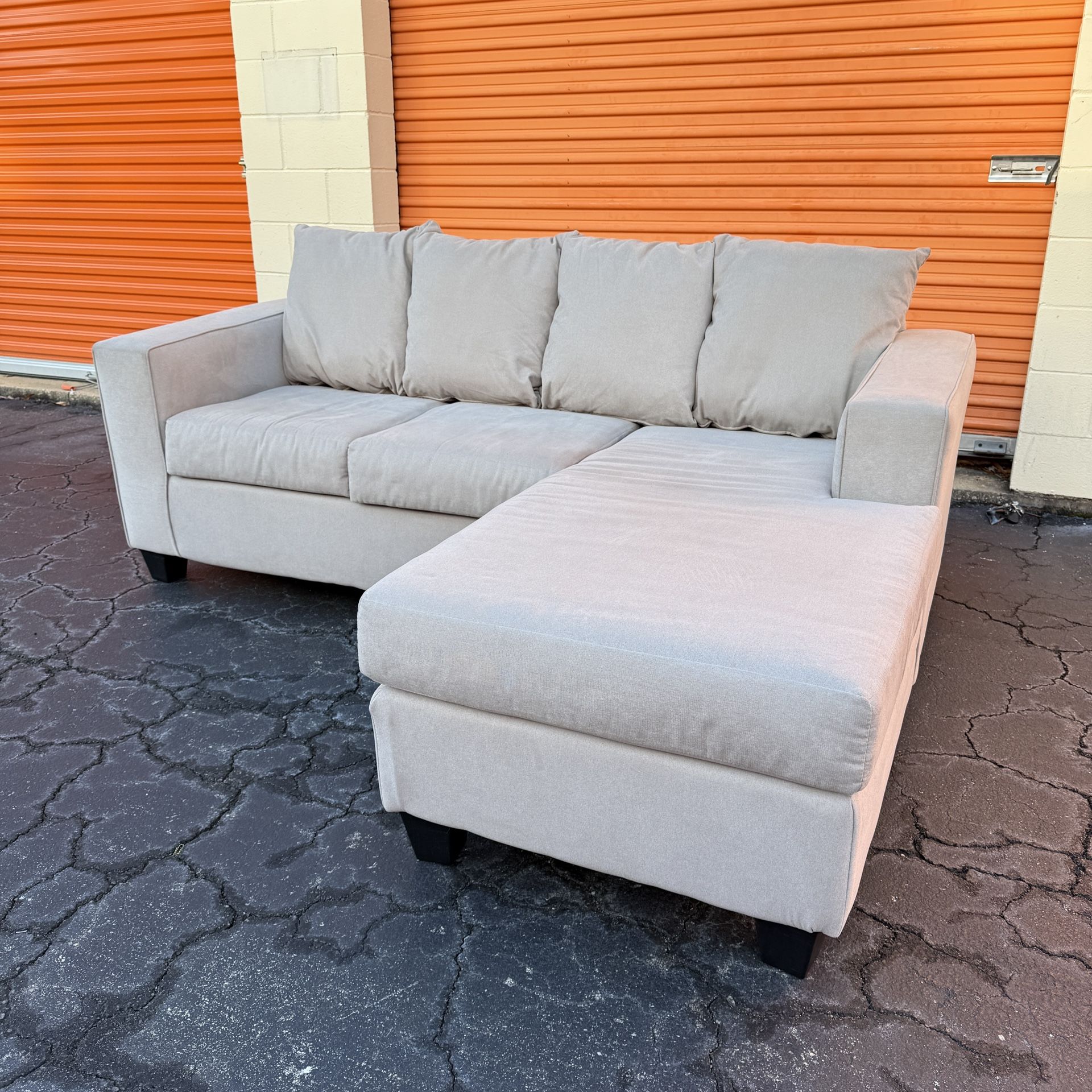Free Delivery - Like New Light Gray Sectional Couch with Reversible Chaise