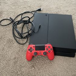 PS4 with red controller