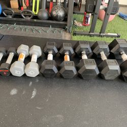 DUMBBELL SET (2) 5 lb, (2) 10 lb, (2) 15 lb, (2) 25 lb, (1) 40 lb ALL NEW