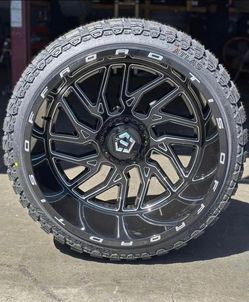 TIS 544BM 24x14 Rims 33x12.50R24 Mud Terrain Tires Finance Available