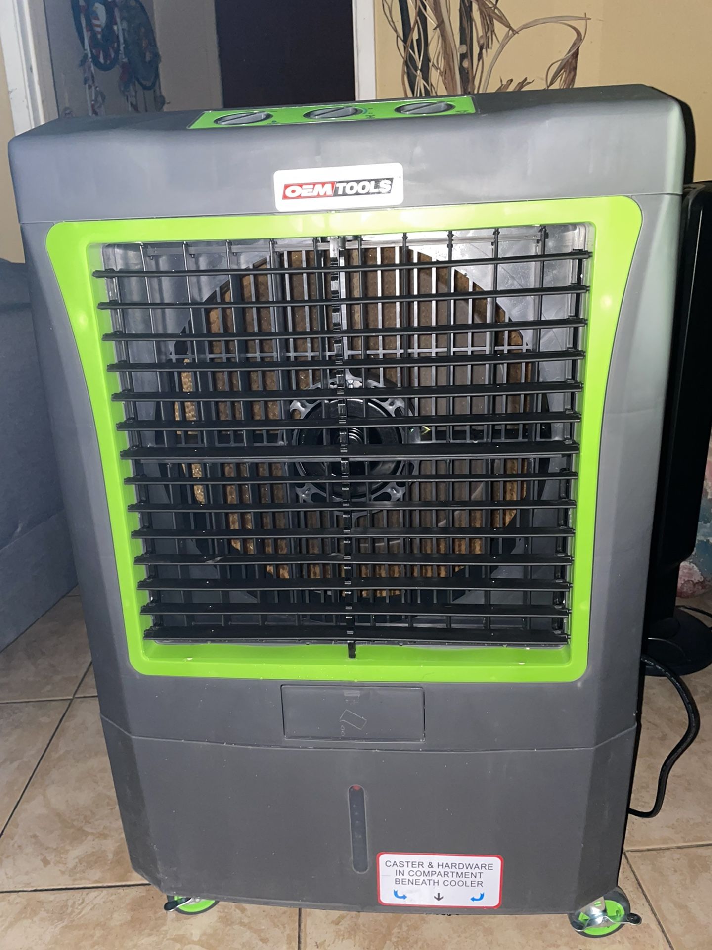 Caster Hardware In Compartment Beneath Cooler