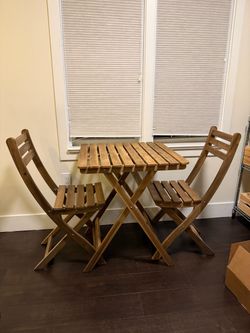 Ikea foldable table and chairs, $40 for the set.