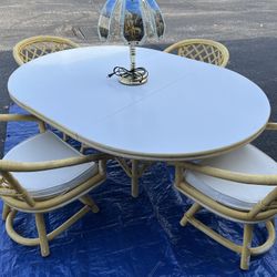 Rattan Table & 4 Swivel Chairs 