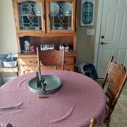 Kitchen Table With Four Chairs And A China Hutch