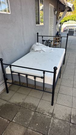Twin bed with mattress