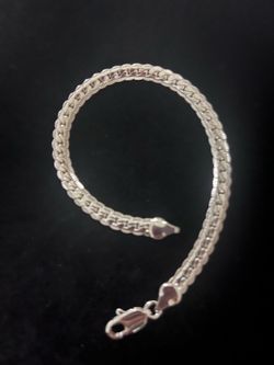 Sterling Silver 925 Overlay 8 Inch Herringbone Bracelet Chain link style and has a lobster clasp