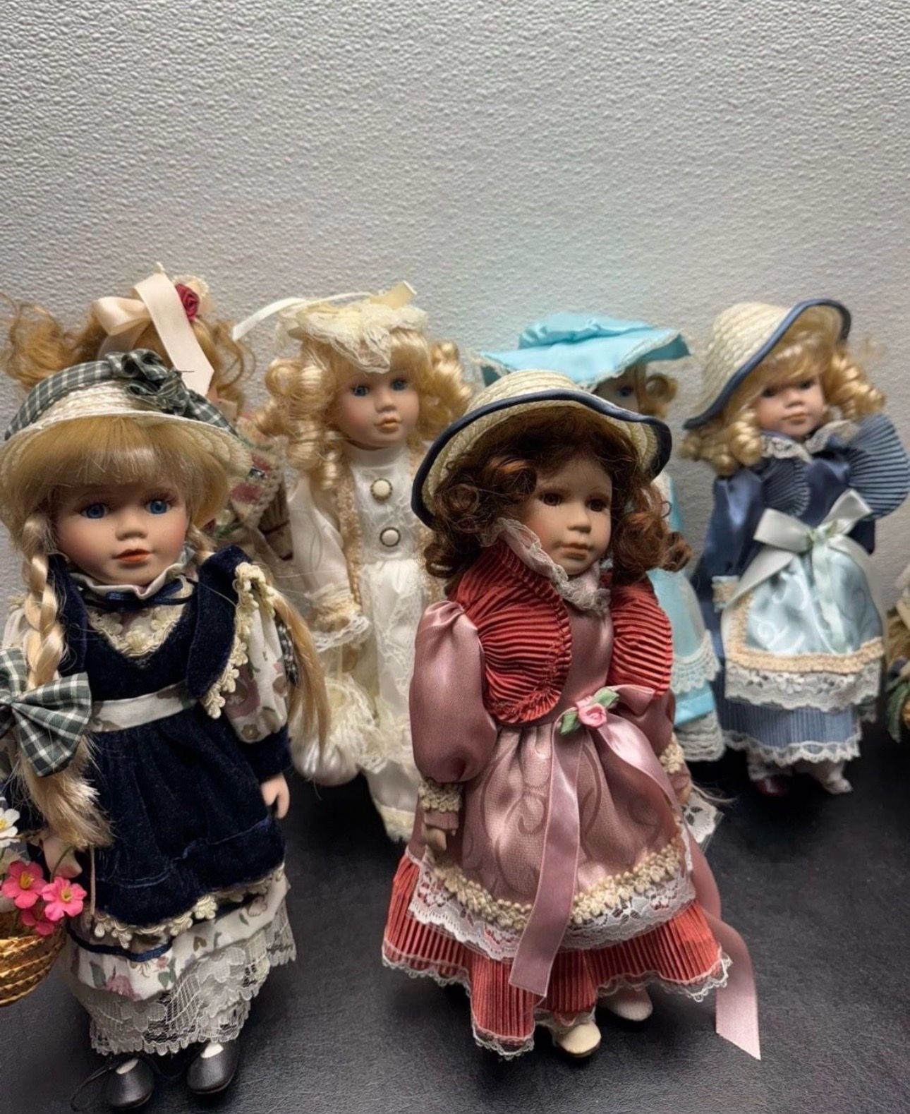 8 Porcelain Dolls for $45