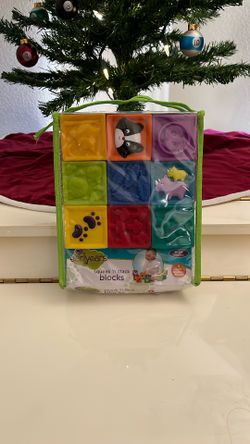 Early years squeak and stack plastic blocks for ages 6 to 24 months