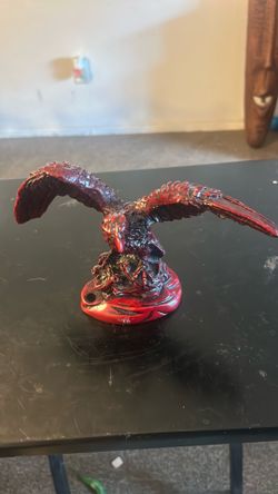 his item is a Deep Dark Red Eagle Wings Spread figurine that can be used as a unique pen holder.
