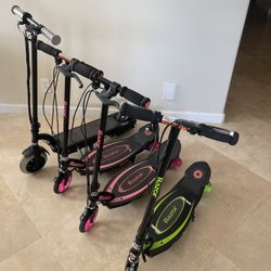 4 RAZOR Scooters - NEEDS NEW BATTERY AND CAHRGE or FOR PARTS 