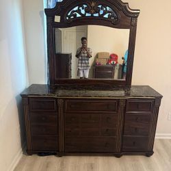 Bedroom set includes: 2 night stands, armoire  with mirror, tall dresser