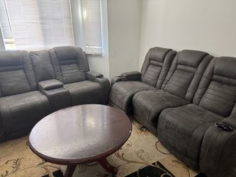Gray Reclining Sofa and Loveseat Set