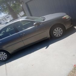 2003 Toyota Camry: Check Engine Light. Oil Or Rings Issue. Selling As Is