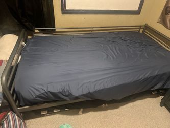 Twin bed with pullout trundle and mattresses