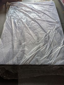 Free new queen mattress.