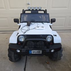 Kid's Ride-On Jeep with Bluetooth Remote 