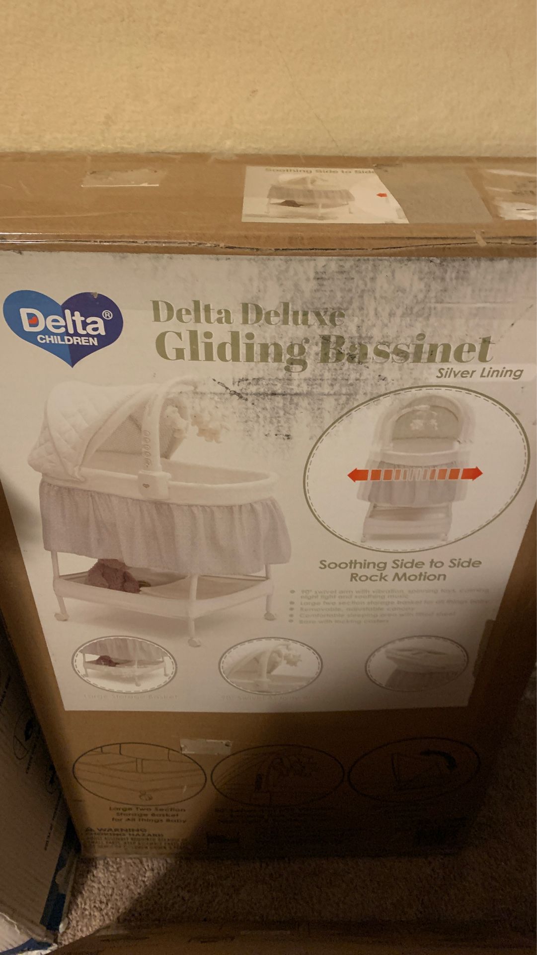 Delta Childrens gliding bassinet