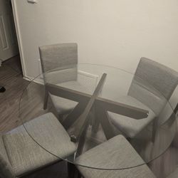 Round Glass Dining Table Set with 4 Gray Canvas Upholstered Chairs, Modern Style