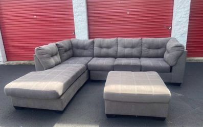 Gray Ashley sectional with ottoman( free delivery)