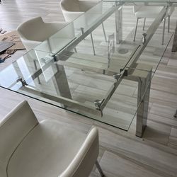Modern Glass Dining Table And Swivel Chairs 