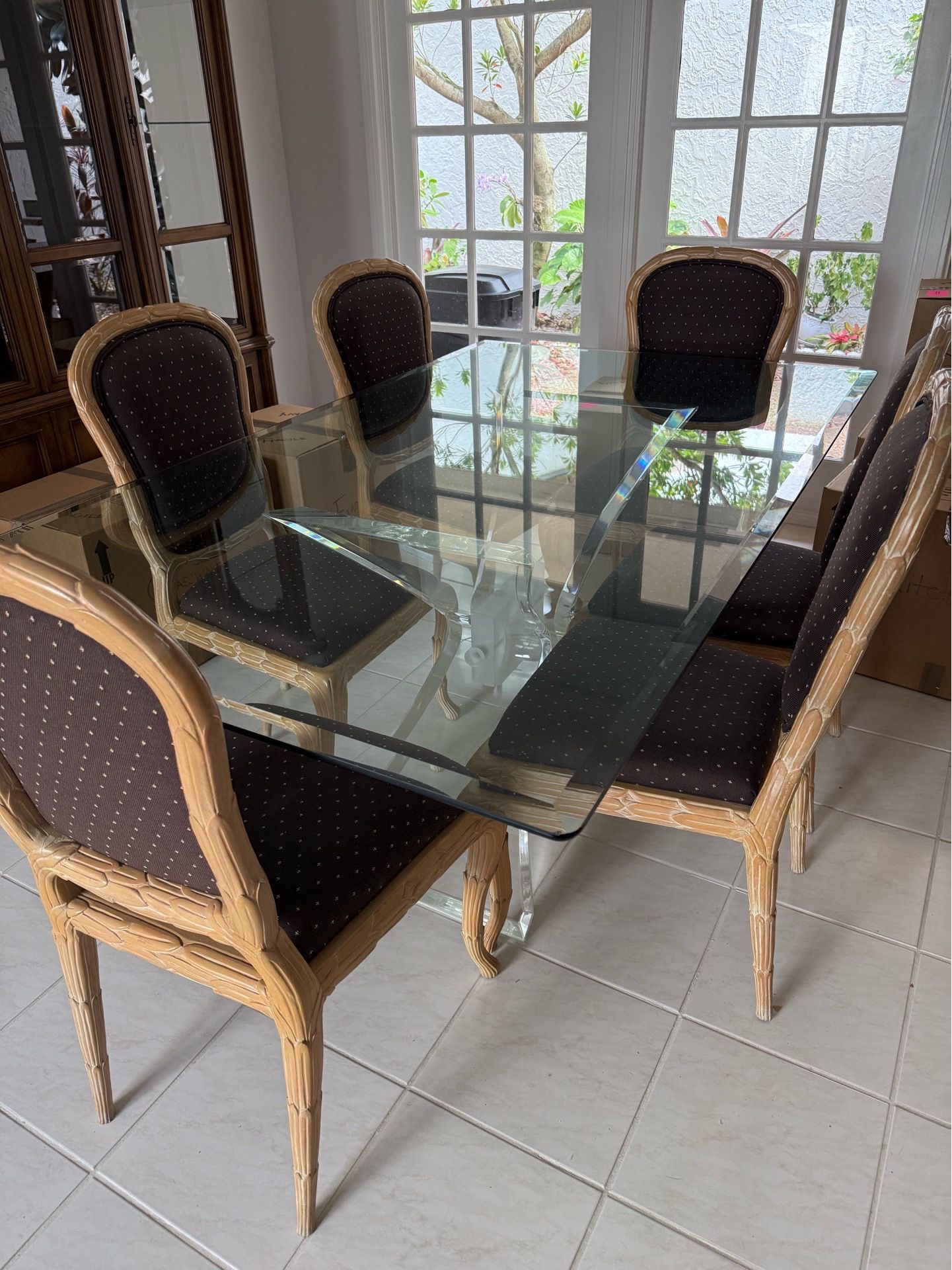 Glass dining room table and 6 upholstered chairs