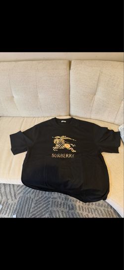 Burberry t shirt size large and XL