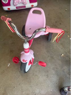 Pink tricycle